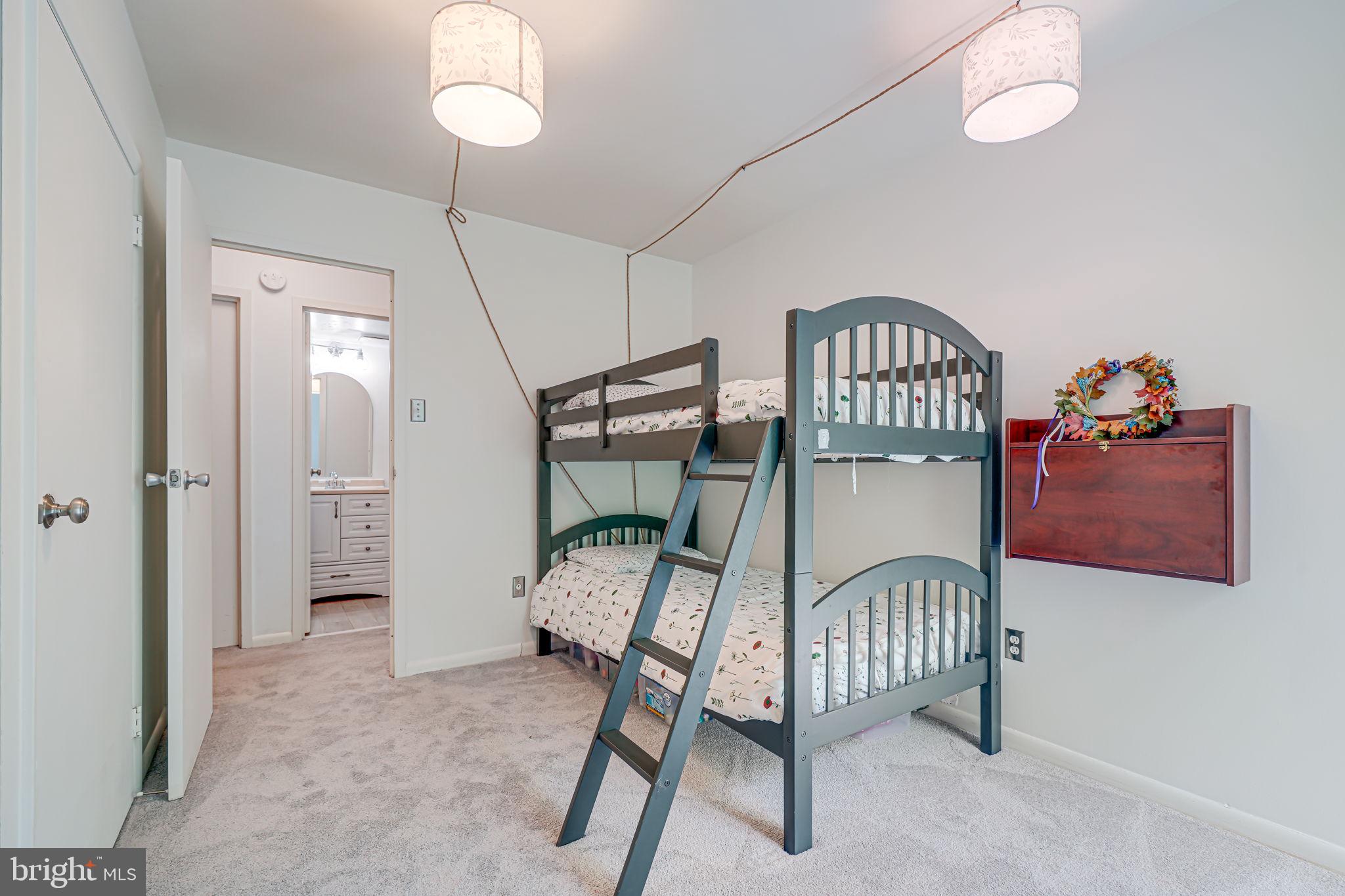 11220 Chestnut Grove Square, Unit 222 Reston, VA 20190 - Photo 20 of 35 a view of a room with furniture and wooden floor