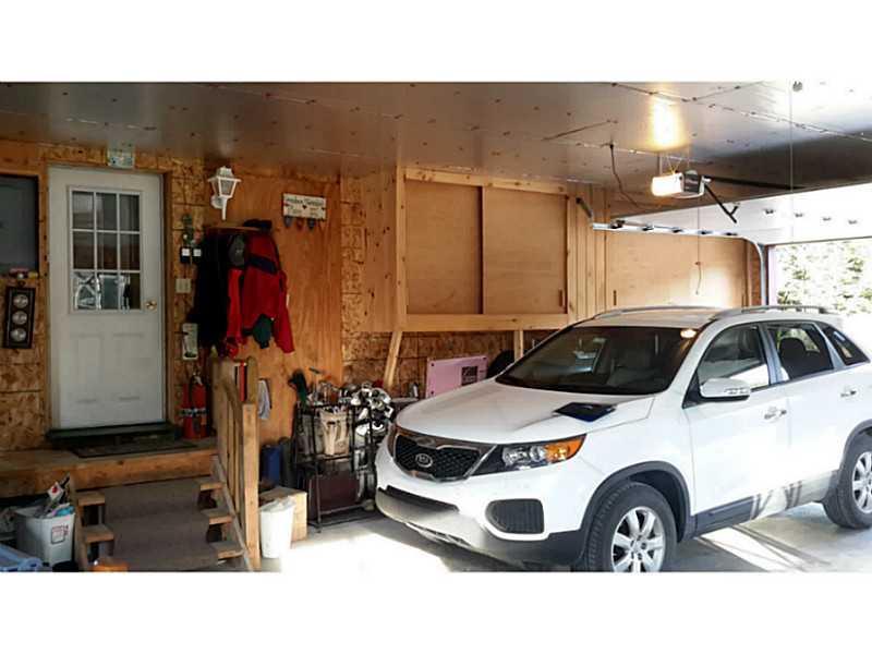 350 Transalpine Road Lincoln, ME 04457 - Photo 24 of 27 Garage. Two openers for 2 of the 3...