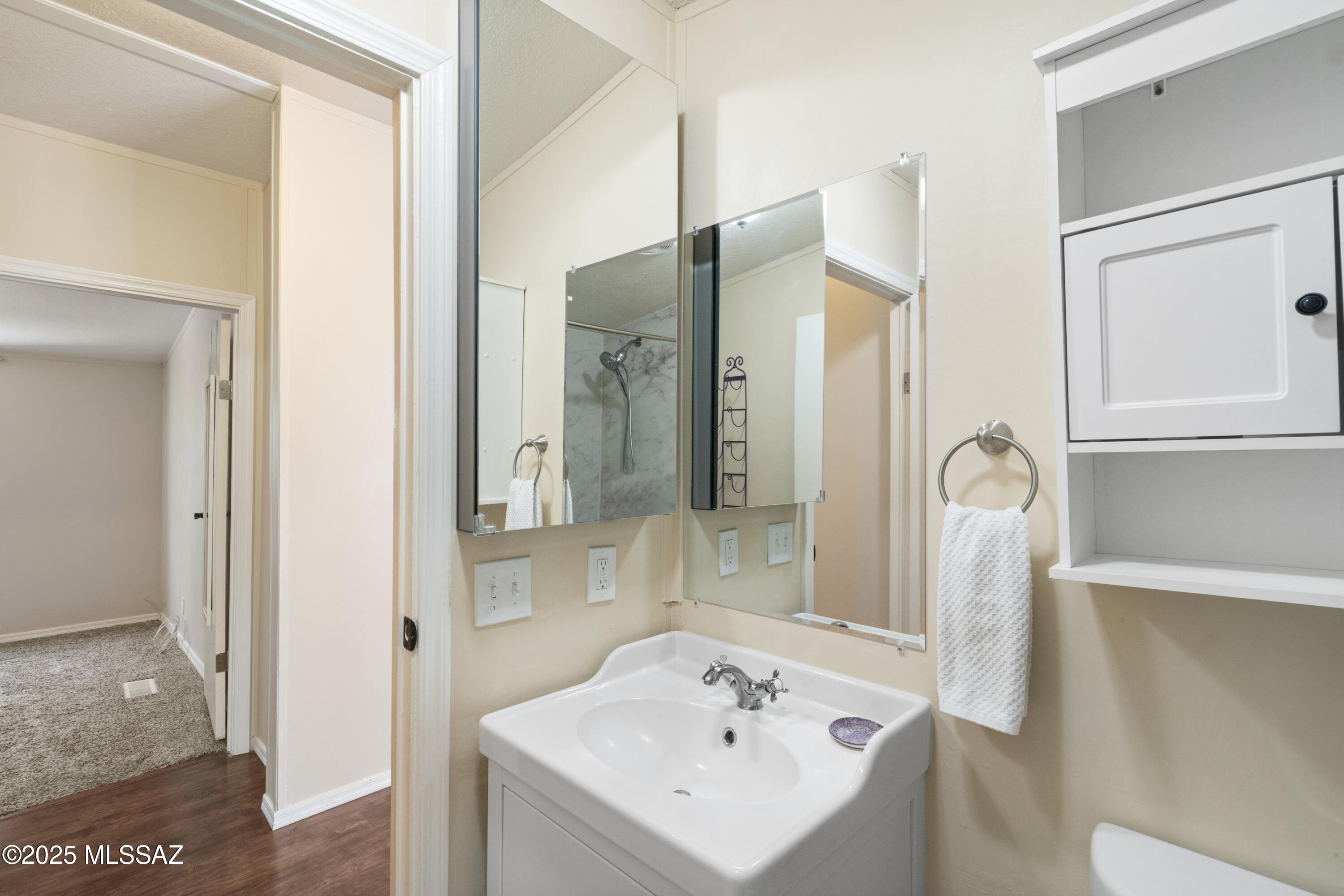 6205 East Rough Rock Drive Tucson, AZ 85756 - Photo 17 of 30 a bathroom with a sink a toilet and shower
