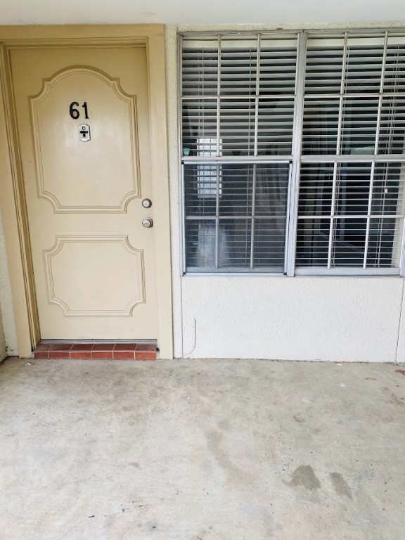 910 Duncan Lane, Unit 61 Austin, TX 78705 - Photo 3 of 22 a view of wooden door