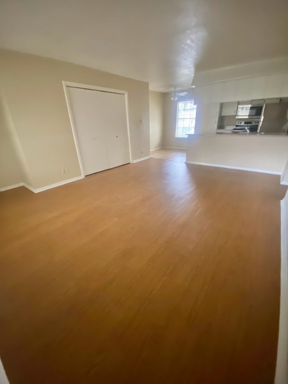 910 Duncan Lane, Unit 61 Austin, TX 78705 - Photo 5 of 22 a view of a kitchen with a sink and cabinets