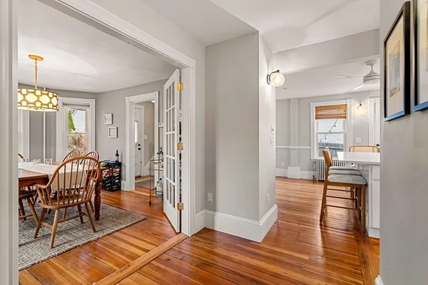 a view of a livingroom with furniture and wooden floor