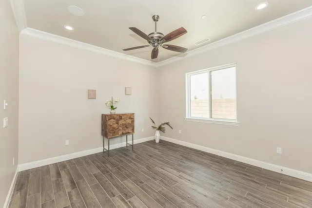 a living room with a couch and a window