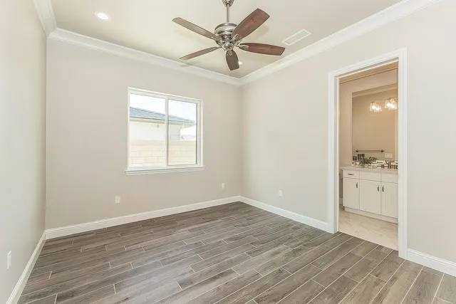 a spacious bathroom with a double vanity sink mirror and double