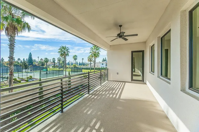 a view of a livingroom with a ceiling fan