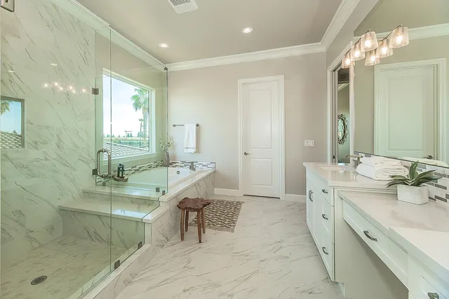 a bathroom with a sink double vanity and a mirror