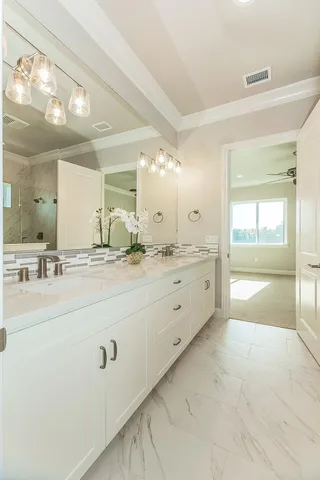 a aerial view of a house with a big yard