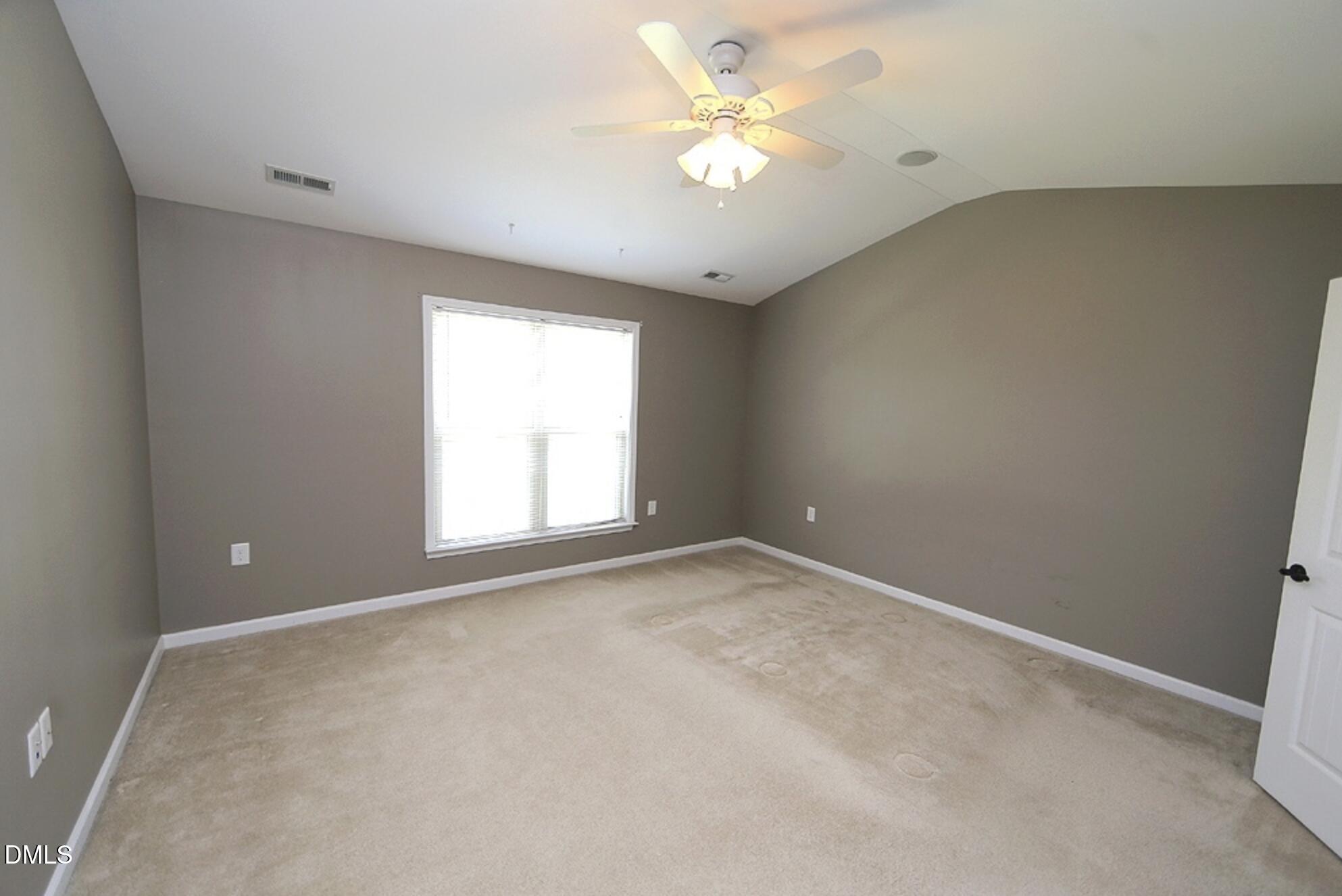326 Brier Crossings Loop Durham, NC 27703 - Photo 7 of 12 an empty room with a window