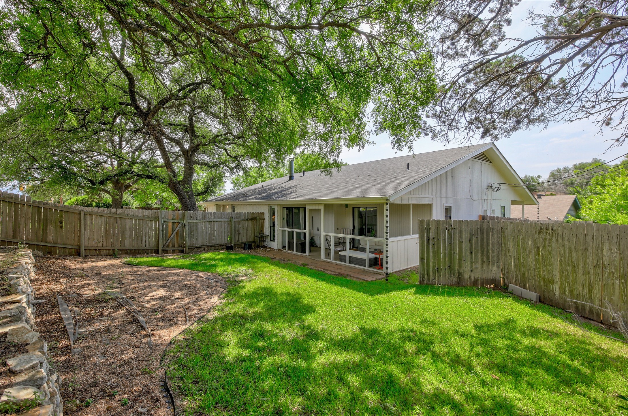 11118 Wandering Way Austin, TX 78754 - Photo 3 of 35 Unit B Yard and large covered patio