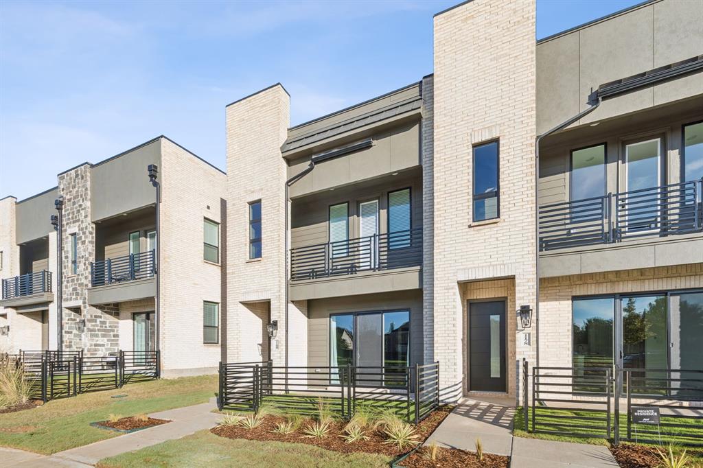 a front view of a building with street view