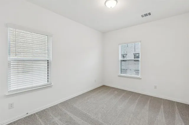 a bathroom with a sink toilet tub and shower