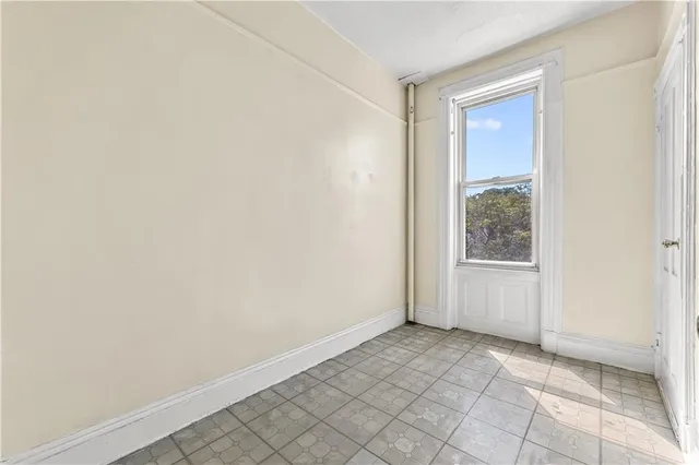 a view of an empty room and window