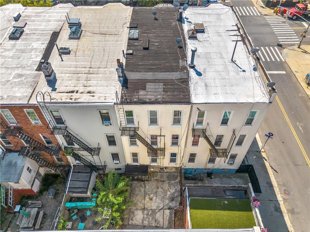 1271 Bushwick Avenue Brooklyn, NY 11207 - Photo 12 of 13 aerial view of a house with large windows