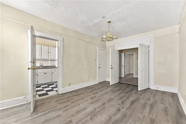 a view of a livingroom with wooden floor