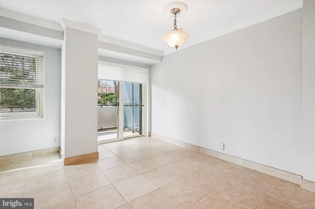 a kitchen with granite countertop a refrigerator oven a sink and dishwasher
