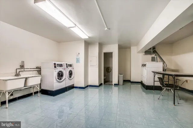 a view of a room with lots of furniture