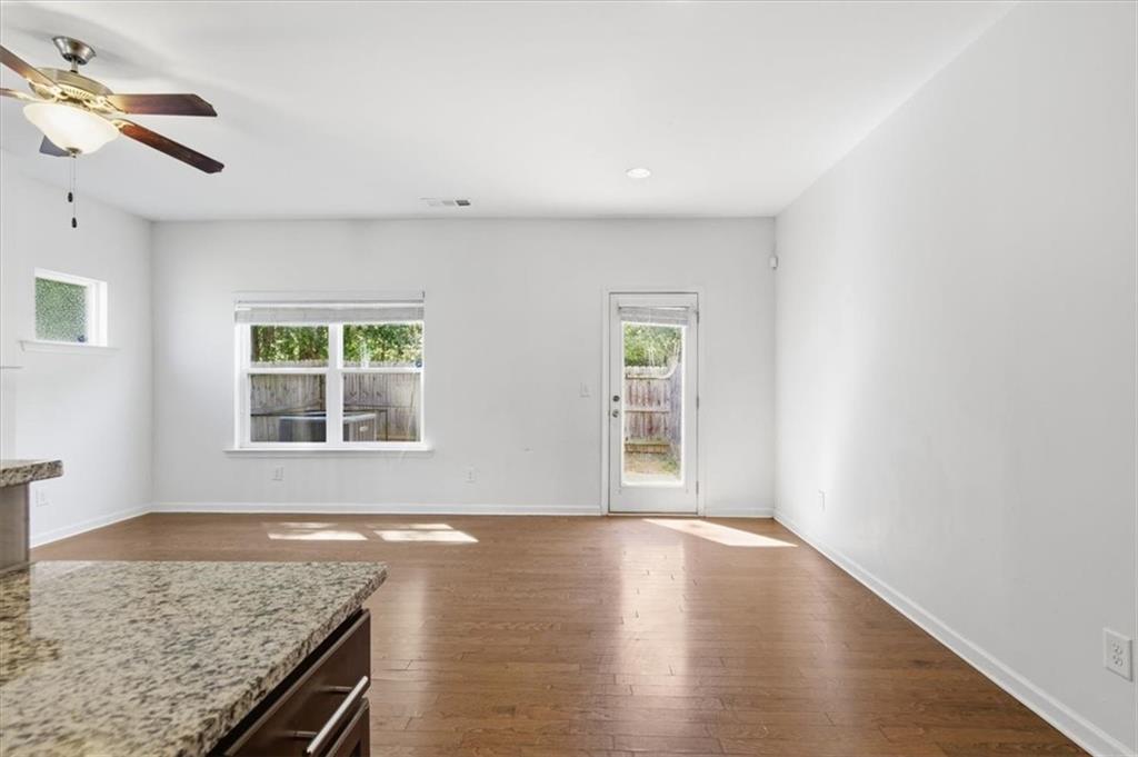 5064 Longview Walk Decatur, GA 30035 - Photo 13 of 30 an empty room with wooden floor and window