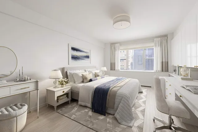 a bathroom with a sink a toilet and a window