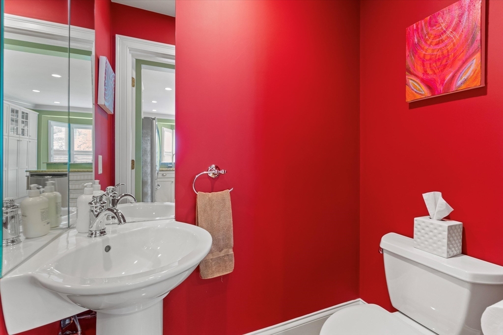 3 A Mill Street, Unit 3A Arlington, MA 02476 - Photo 11 of 38 a bathroom with a sink a toilet and mirror