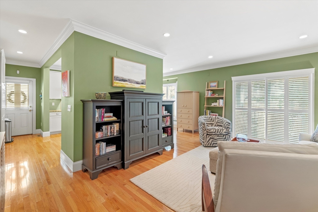 3 A Mill Street, Unit 3A Arlington, MA 02476 - Photo 13 of 38 a living room with furniture and a flat screen tv