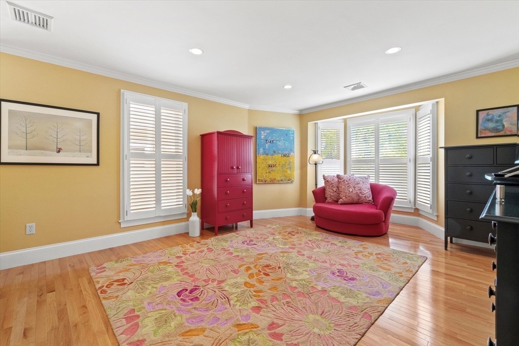 3 A Mill Street, Unit 3A Arlington, MA 02476 - Photo 20 of 38 a bedroom with furniture and a window