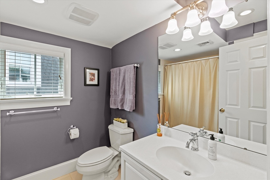 3 A Mill Street, Unit 3A Arlington, MA 02476 - Photo 30 of 38 a bathroom with a sink toilet and shower