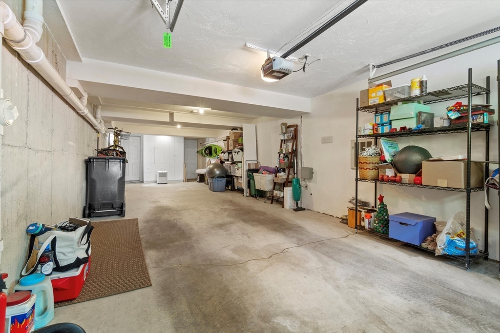 3 A Mill Street, Unit 3A Arlington, MA 02476 - Photo 35 of 38 a room with gym equipment and toys