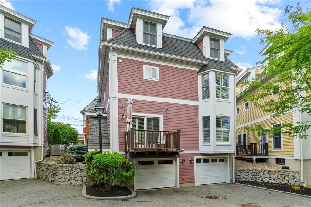 3 A Mill Street, Unit 3A Arlington, MA 02476 - Photo 37 of 38 a front view of residential houses with street