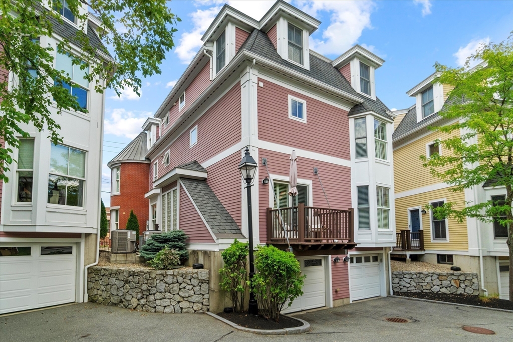 3 A Mill Street, Unit 3A Arlington, MA 02476 - Photo 38 of 38 a view of a yard in front of a building