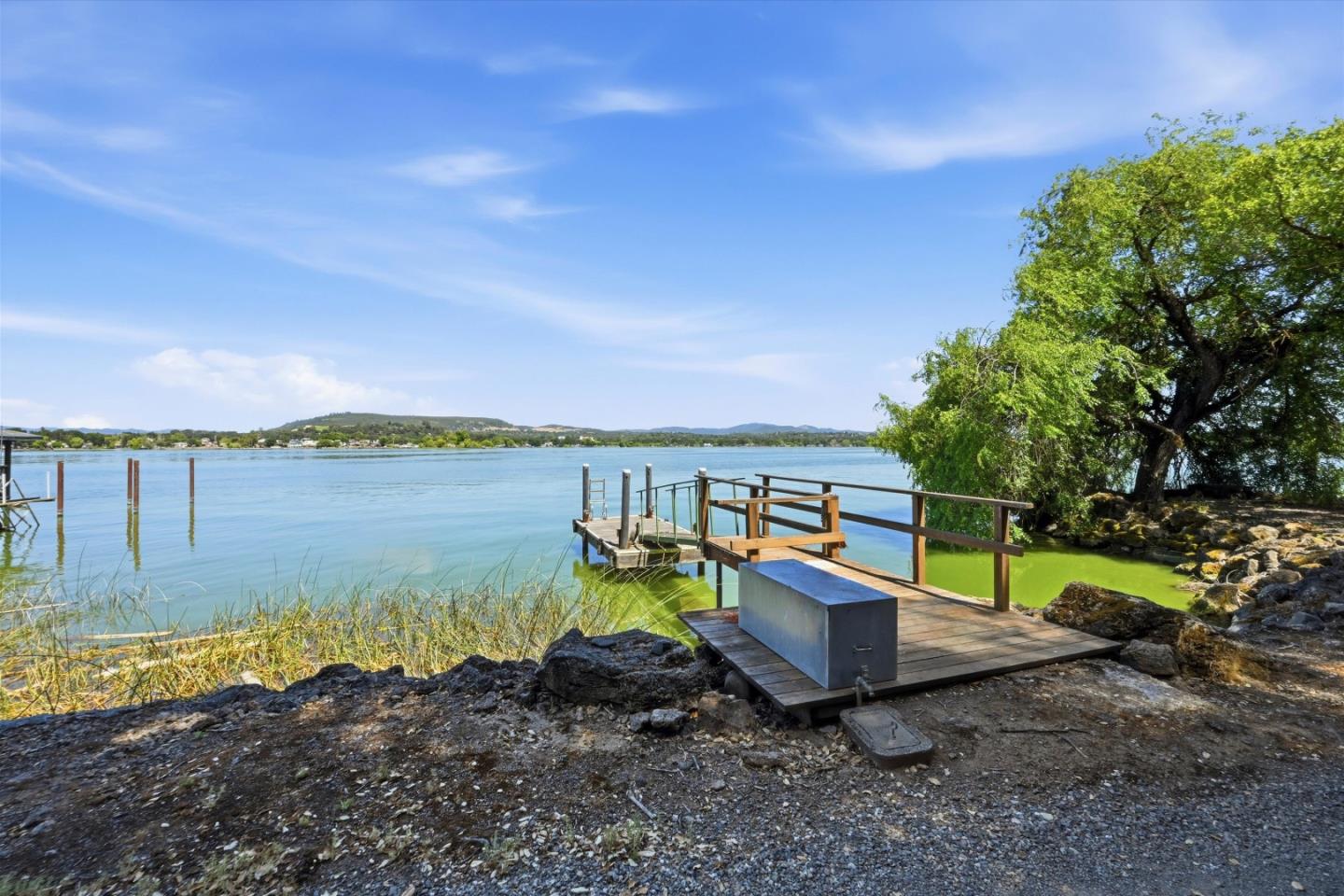 5156 Lake Road Lower Lake, CA 95457 - Photo 24 of 27 a view of a lake with a yard