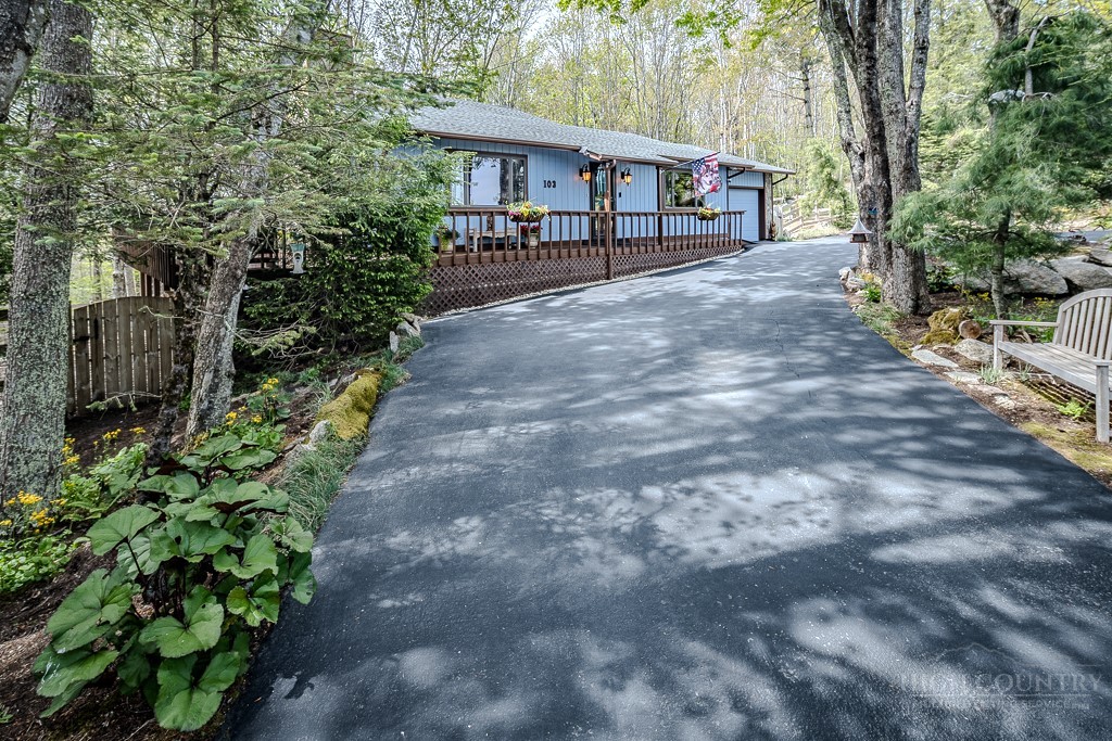 103-105 Upper Grouse Ridge Road Beech Mountain, NC 28604 - Photo 45 of 48 a view of a yard in front of house