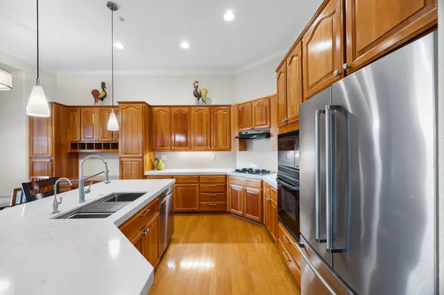 a living room with a bed furniture and a window
