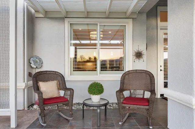 a view of a house with sitting area