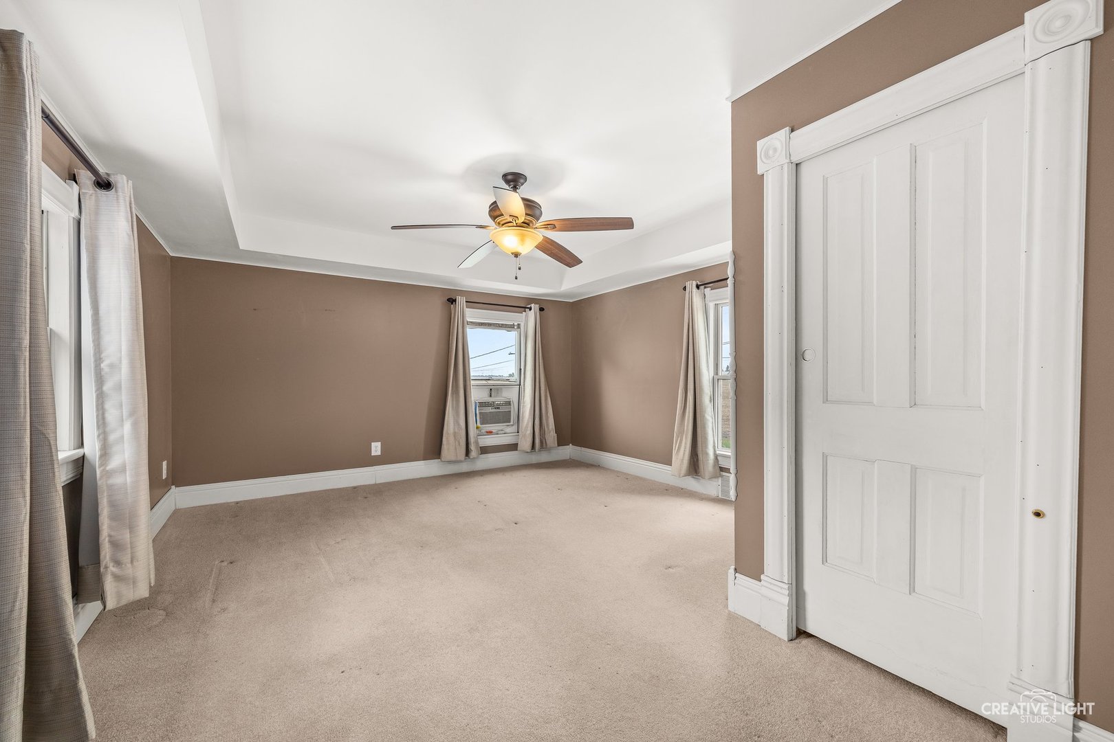 209 North Shabbona Road Shabbona, IL 60550 - Photo 15 of 25 a view of a livingroom with a ceiling fan and window