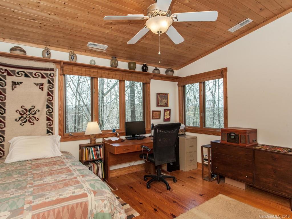 2831 Polk County Line Road Rutherfordton, NC 28139 - Photo 18 of 30 a view of a livingroom with workspace and a window