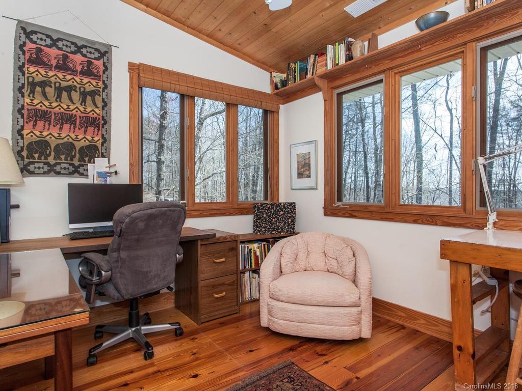 2831 Polk County Line Road Rutherfordton, NC 28139 - Photo 19 of 30 a livingroom with workspace and a window