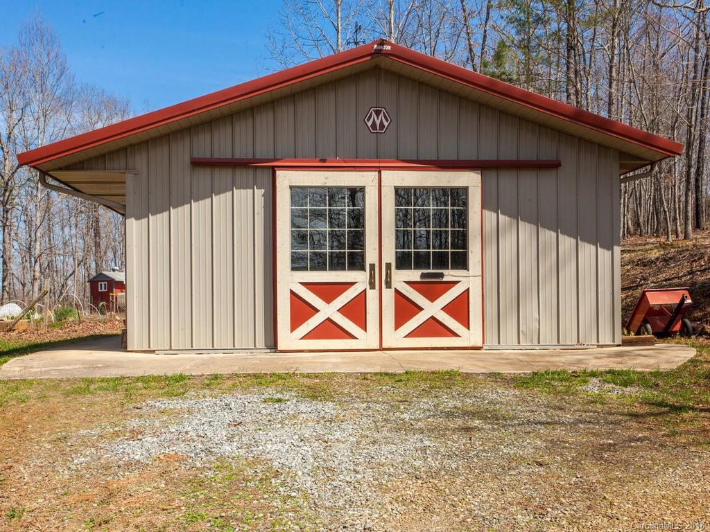2831 Polk County Line Road Rutherfordton, NC 28139 - Photo 22 of 30 a view of a house with wooden fence