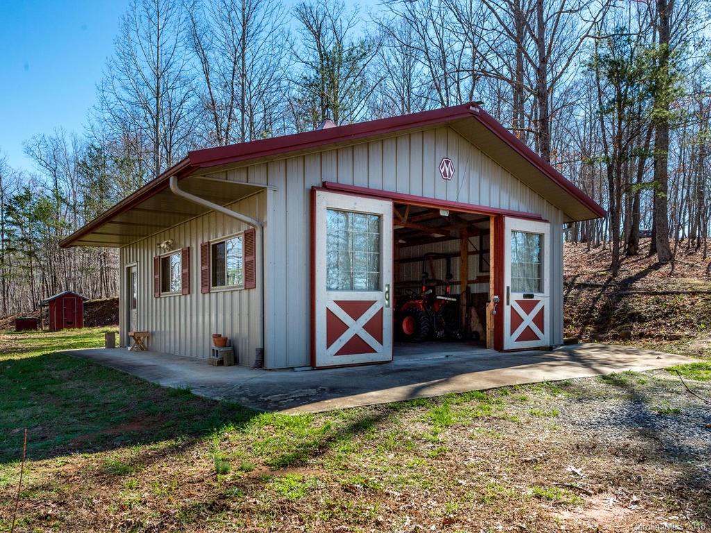 2831 Polk County Line Road Rutherfordton, NC 28139 - Photo 23 of 30 a view of a small house with backyard