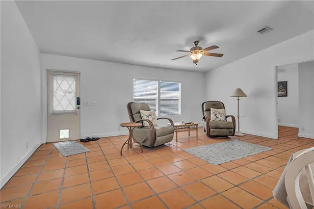a bedroom with a bed and a cabinets