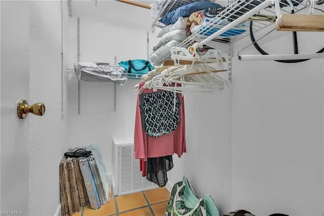 a bathroom with a toilet and a shower curtain