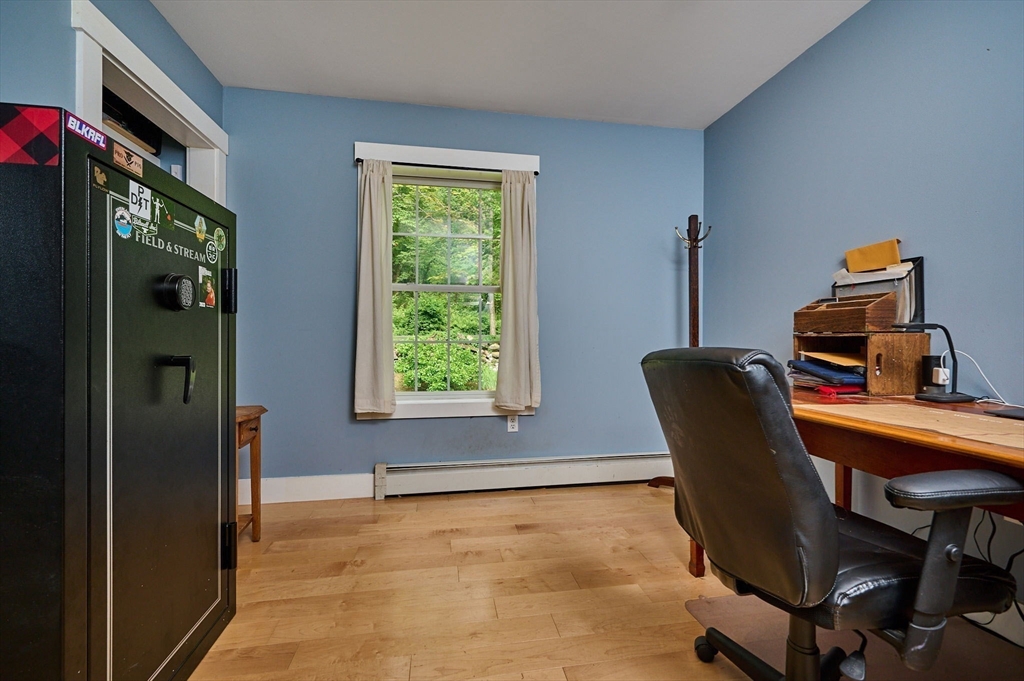 77 Reynolds Road Shelburne, MA 01370 - Photo 11 of 34 a workspace with furniture and a window