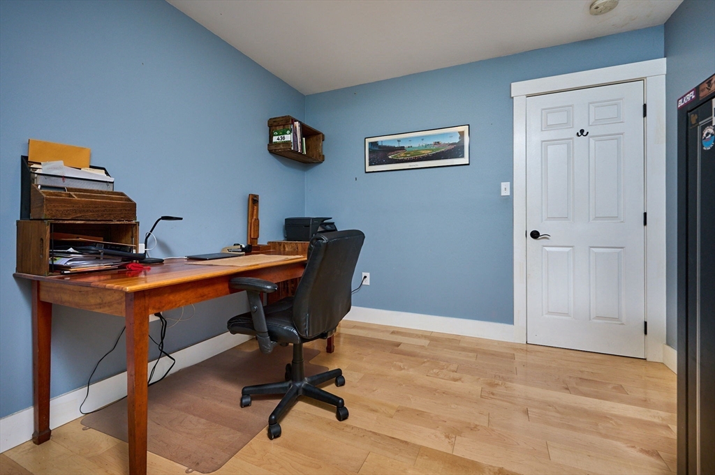 77 Reynolds Road Shelburne, MA 01370 - Photo 12 of 34 a view of a workspace with furniture