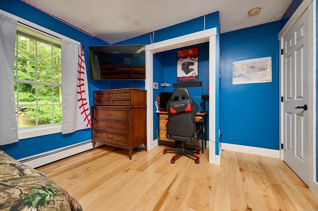 77 Reynolds Road Shelburne, MA 01370 - Photo 14 of 34 a bed room with a bed and a window