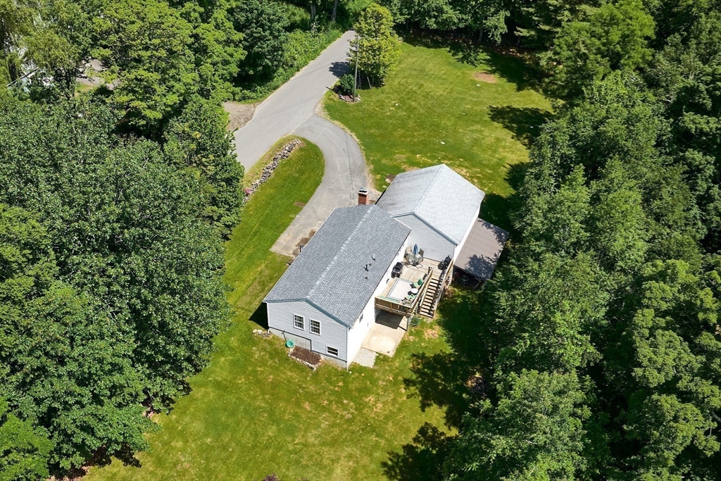 77 Reynolds Road Shelburne, MA 01370 - Photo 27 of 34 an aerial view of a house with a yard and swimming pool