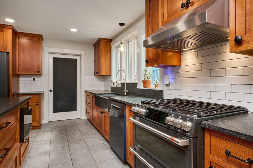 77 Reynolds Road Shelburne, MA 01370 - Photo 4 of 34 a kitchen with stove and cabinets