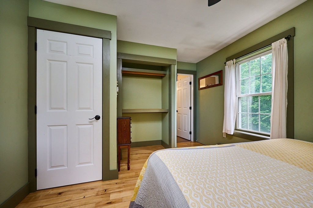 77 Reynolds Road Shelburne, MA 01370 - Photo 9 of 34 a bedroom with a bed and a window