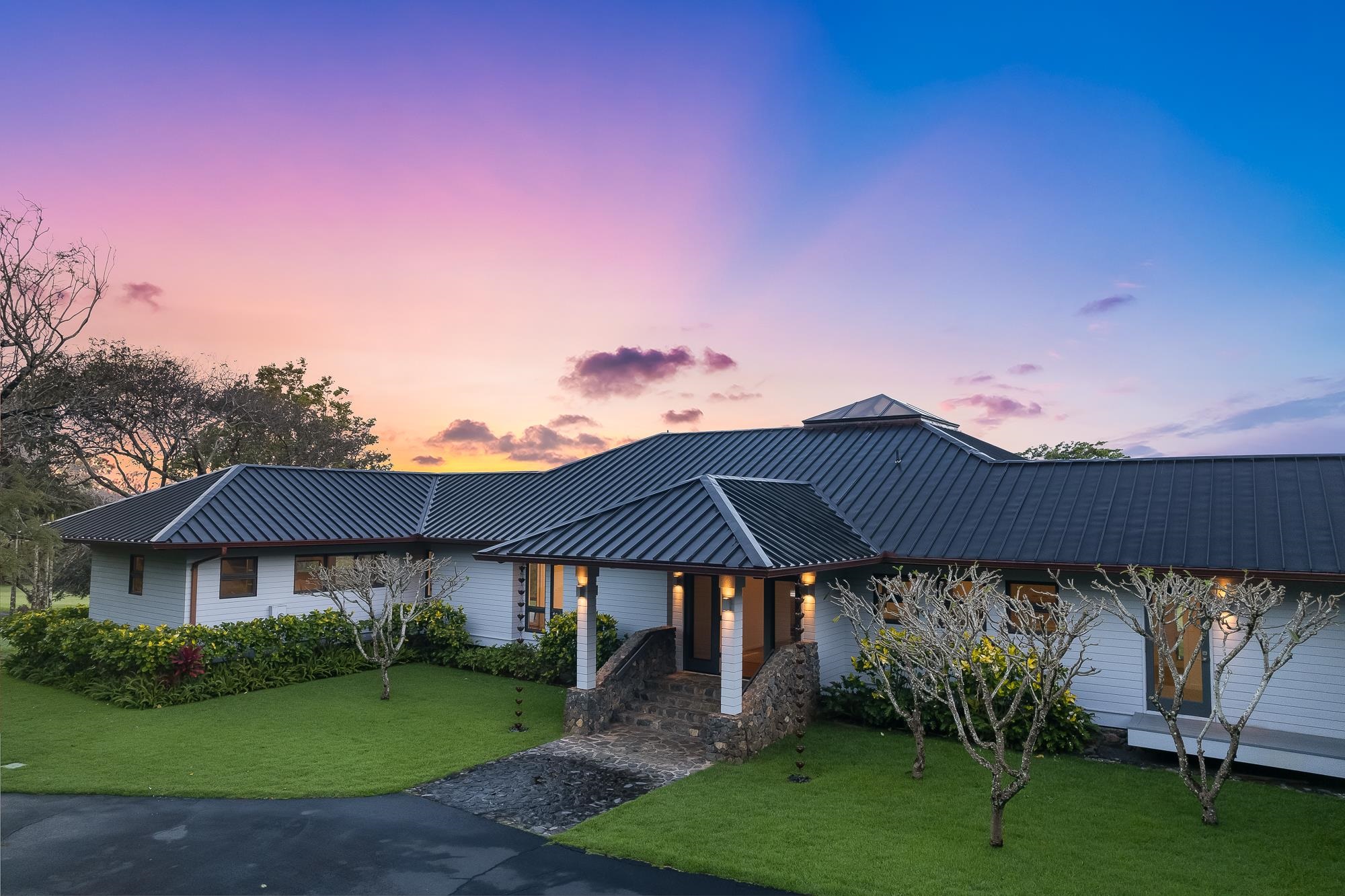 a backyard of a house with lots of green space