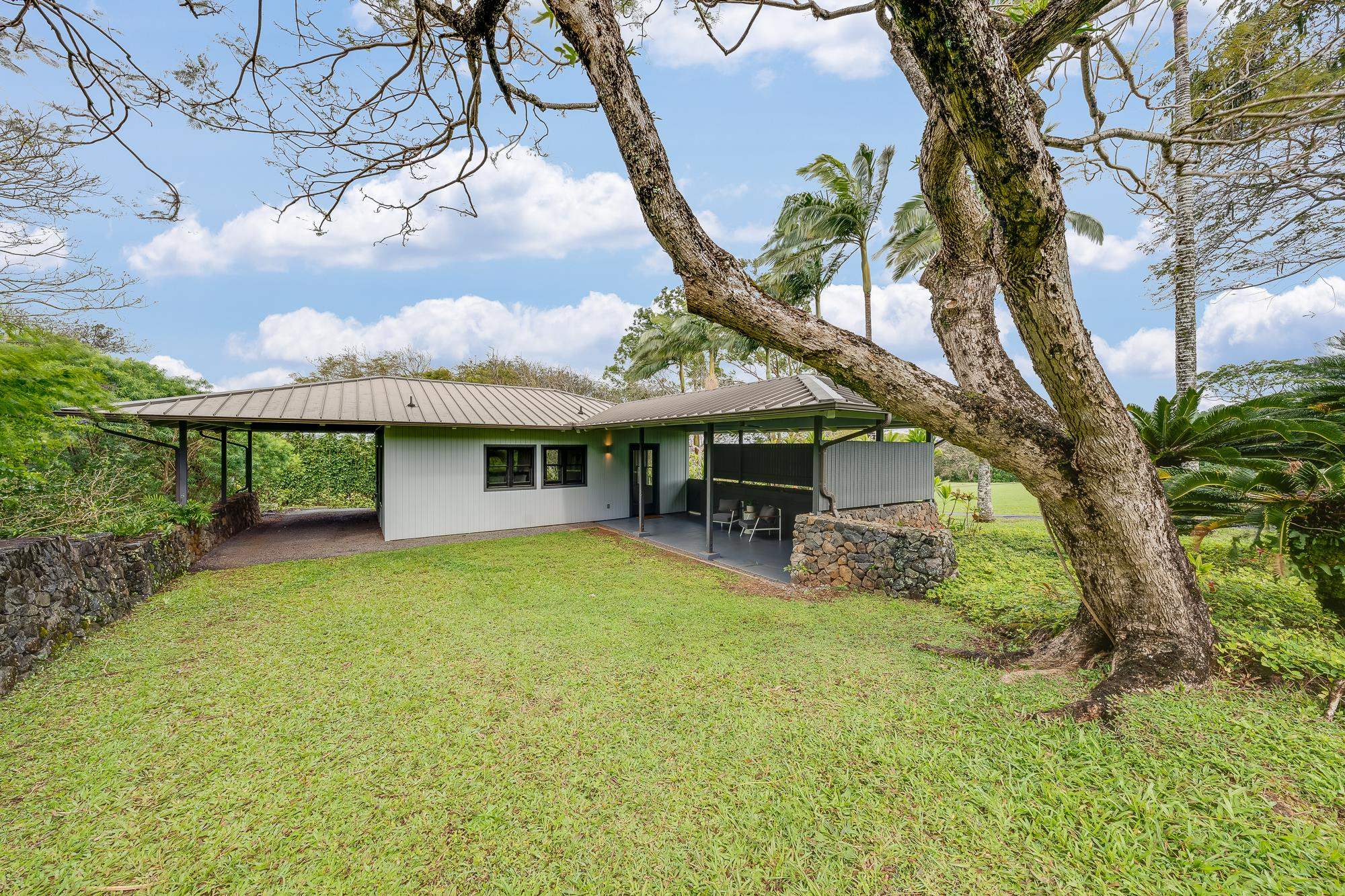 917 Hog Back Road Haiku, HI 96708 - Photo 22 of 30 a view of a house with pool and sitting area