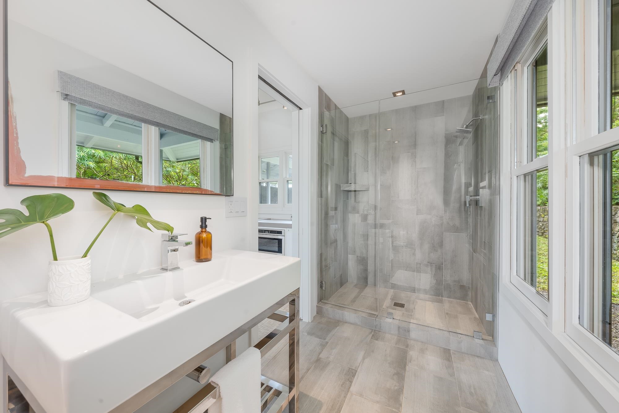 917 Hog Back Road Haiku, HI 96708 - Photo 26 of 30 a bathroom with a sink and a shower