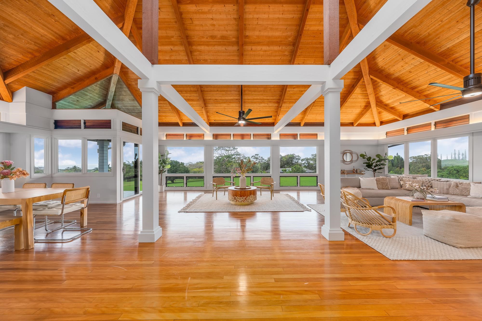 917 Hog Back Road Haiku, HI 96708 - Photo 3 of 30 a living room with patio furniture and a floor to ceiling window